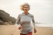 canvas print picture - Jogging workout. Middle aged caucasian woman during jogging workout on the morning beach. Be alone with yourself during a morning run and recharge your batteries for the whole day.