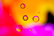 © Oleg - bubbles on abstract orange background, oil in water