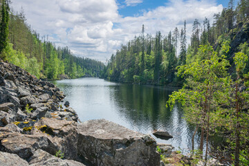 Wall Mural - View of the canyon lake Julma-Olkky, Hossa National Park, Kuusamo, Finland