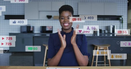 Sticker - Animation of multiple notification bars over smiling african american woman clapping at home