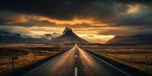 Straight Highway Leading To Majestic Mountain In Iceland