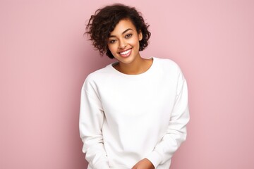 female wearing white sweatshirt on light pink background for mock up