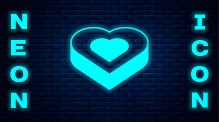 Canvas Print - Glowing neon Candy in heart shaped box icon isolated on brick wall background. Valentines Day. Vector