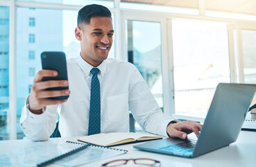Poster - Laptop, phone and business man typing in office, multitask and working on project. Computer, smartphone and happy consultant on internet, networking on email app and research information on website