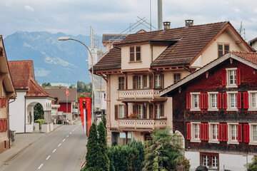 Alpnachstad, Switzerland - August 9, 2023: Beautiful facades of the Swiss Alpnachstad