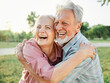 © Lumos sp - woman man senior couple happy retirement together elderly active vitality park fun smiling love old nature wife happiness mature hug park outdoor
