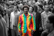 canvas print picture - Happy african man with colorful clothes in a crowd of black and white