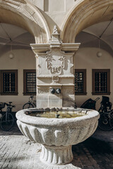 Wall Mural - Drinking water fountain in Lucerne, Switzerland