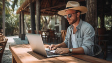 Young lifestyle digital nomad working on the laptop