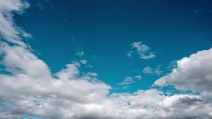 Wall Mural - timelapse of clouds on a blue sky on summer sunny day