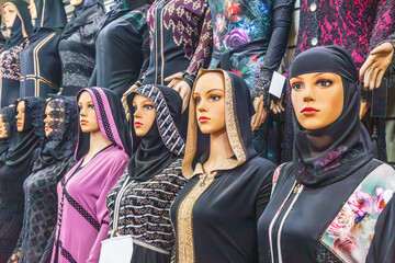 Wall Mural - Mannequins in head scarves, or hijabs.