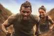 Portrait of man and woman participating in obstacle course in boot camp