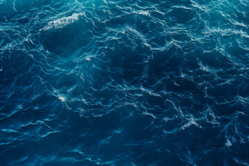 High angle shot of the Deep blue ocean with waves and ripples