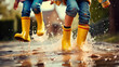 Several children wearing rain yellow boots, jumping and splashing in puddles as rain falls around them. The shot convey a strong summer vibe, be a close.