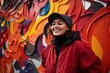 © QuietWord - happy woman wearing red jacket with graffiti street art background, Generative Ai