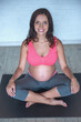 © georgerudy - Pregnant woman doing yoga