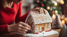 Woman holding christmas gingerbread house. Generative Ai