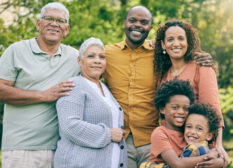 Wall Mural - Portrait, happy and big family in nature, interracial and having fun together outdoor. Face, grandparents and children, mother and father smile for bonding in connection, love and care at park.