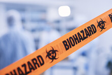 Lab Safety, Science And Tape For A Biohazard, Hospital Security Or Medical Emergency. Caution, Room And People In A Building With An Orange Warning Sign For Danger, Barrier Or Cleaning In A Clinic