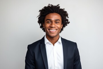 a curly hair businessman smile on white background