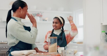 Wall Mural - Cooking, help and high five with mother and daughter in kitchen for cookies, motivation or learning. Food, love and support with woman and young girl in family home for success, goal or breakfast