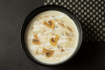 Creamy Mushroom Soup served in bowl isolated on background top view of bangladesh and indian food