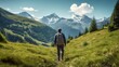 © HandmadePictures - Male hiker, full body, view from behind, walking on a trail in the alps
