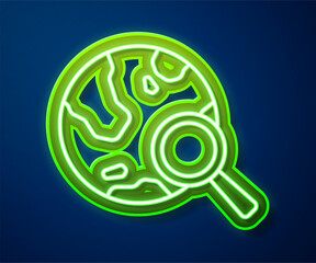 Sticker - Glowing neon line Magnifying glass with globe icon isolated on blue background. Analyzing the world. Global search sign. Vector