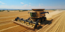 Aerial view of combine harvester in vast wheat field. Harvesting, autumn, horizontal banner. 