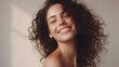 © Bulder Creative - Portrait of smiling girl enjoying beauty treatment on beige background. Beautiful natural woman looking at copy space, spa and wellness concept. Carefree laughing woman with bare shoulders isolated