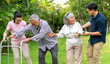 © Art_Photo - Portrait enjoy happy smiling love multi-generation asian big hug family.Senior mature father and elderly mother with young adult woman and son outdoor in park at home.insurance concept
