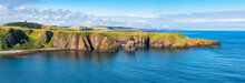 Panoramic View Of The Seaside Cliffs On The East Coast Of Scotland, Stonehaven, UK