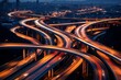 expansive highway interchange emerges, its complexity reminiscent of a modern art piece. Long exposure photography captures streaks of luminous white and red, as vehicles weave a tapestry of light