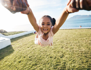 Wall Mural - Girl, spin and outdoor portrait in pov, holding hands or happy for game with parent, holiday or backyard. Female child, smile and swing in air, fast or excited for play on vacation in summer sunshine