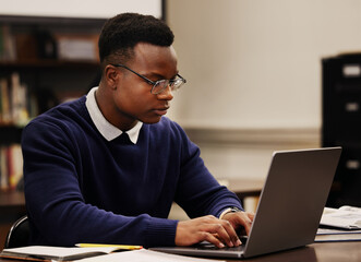 Poster - Student, learning and black man typing on a laptop in university or college campus working on assignment project. Online, studying and young person prepare for internet exam or doing research