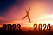 © joyfotoliakid - 2024 New year Silhouette young man Freedom and Happy new year