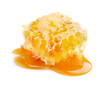 Honeycomb with honey on white background