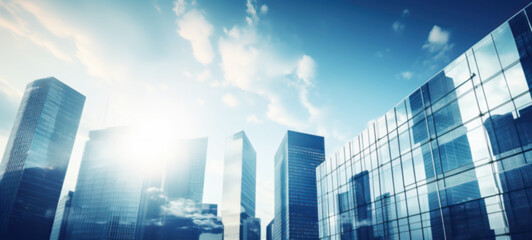 Wall Mural - Modern office building with blue sky, and glass facades. Economy, finances, business activity concept, Bottom-up view, blurred image