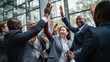© Studio Nova - Motivated multinational team raise high fives after finding problem solution as successful brainstorm result.