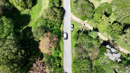 Poster - Aerial view of vehicles travelling along road