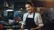 © Fred - Happy chef woman in uniform cooking in kitchen in ruxury restaurant