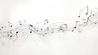 Musical notes lying on music sheet on white wooden background