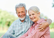 © Lumos sp - woman man senior couple happy retirement together elderly hug active bonding park outdoor sitting bench leisure fun smiling love old nature wife happiness mature