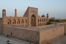 Alla-Kuli-khan Madrasah In The Courtyard Of Ichan-Kala. Ichan-Kala Is The Inner City Of The Ancient Uzbek Town Of Khiva. The City Is Surrounded By Powerful Walls . 