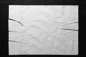 Sheet of white paper with folds close-up.