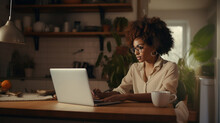 Dark Skin Young Attractive Woman Behind Laptop At Home Scrolling The Internet Or Working