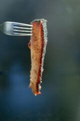 Canvas Print - smoked brisket pick up by a fork