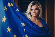 Beautiful Young Blonde Woman Wrapped In A European Flag