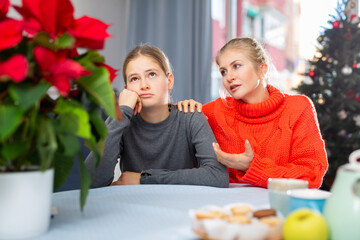 Wall Mural - Mom soothes her teen daughter after a domestic fight