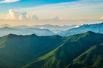green mountain nature landscape at sunrise. panoramic view.